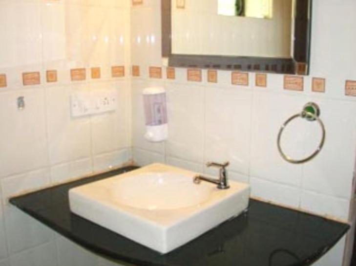 Hotel Balaji Calangute Resort Quarto foto